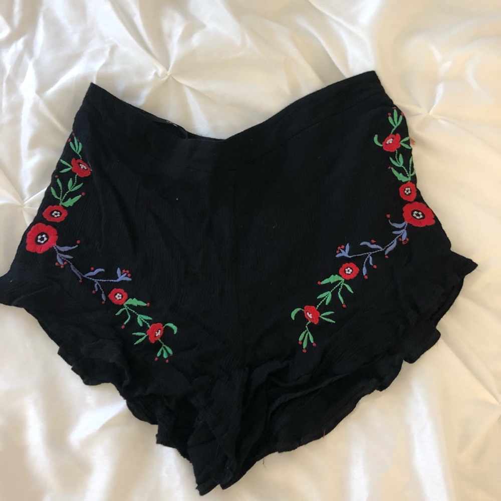 Floral embroidered black shorts